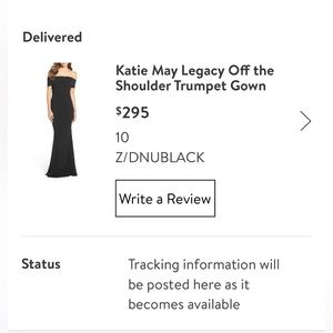 Katie May off the shoulder gown.  Size 10 petite, color black.  Like new!